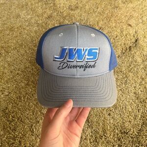 Blue and grey Port Authority trucker hat; perfect condition, never worn